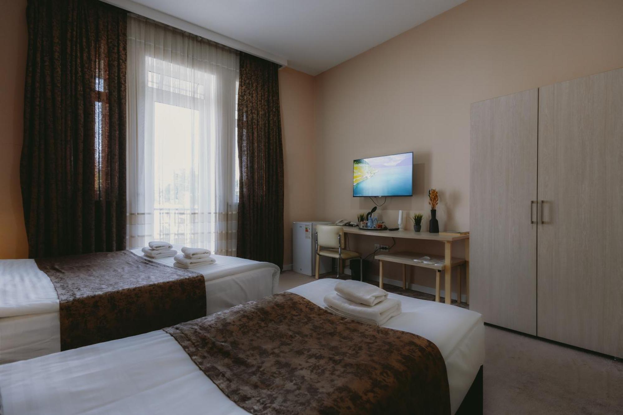 City Hotel Tasjkent Buitenkant foto